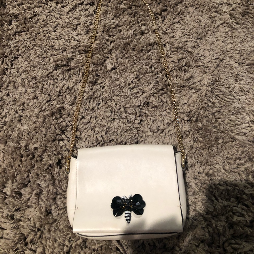 Cream colored gold chain purse